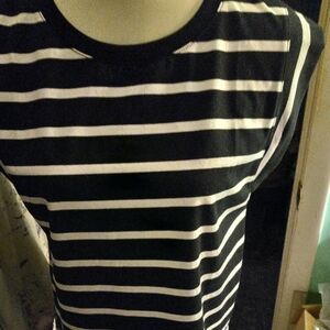 New,with tag black&white striped stretch knit top with cap sleeves size medium.